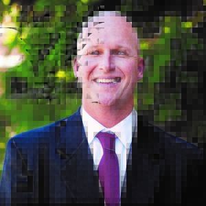 A person (David R Cillay) smiling