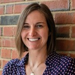 A person (Emily West) smiling