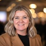 A person (Holly Anderson) smiling