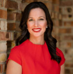 A person (Jocelyn Widmer) smiling