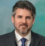 A person (Sean Doyle) smiling