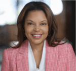 A person (Tatum Thomas) smiling