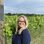 A person (Whitney Kilgore) smiling