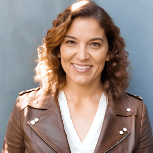 A person (Kira Heske) smiling