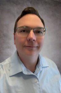 A person (Stephen Scheib) smiling