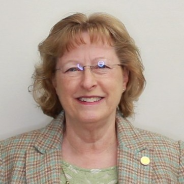 A person (Vickie Cook) smiling