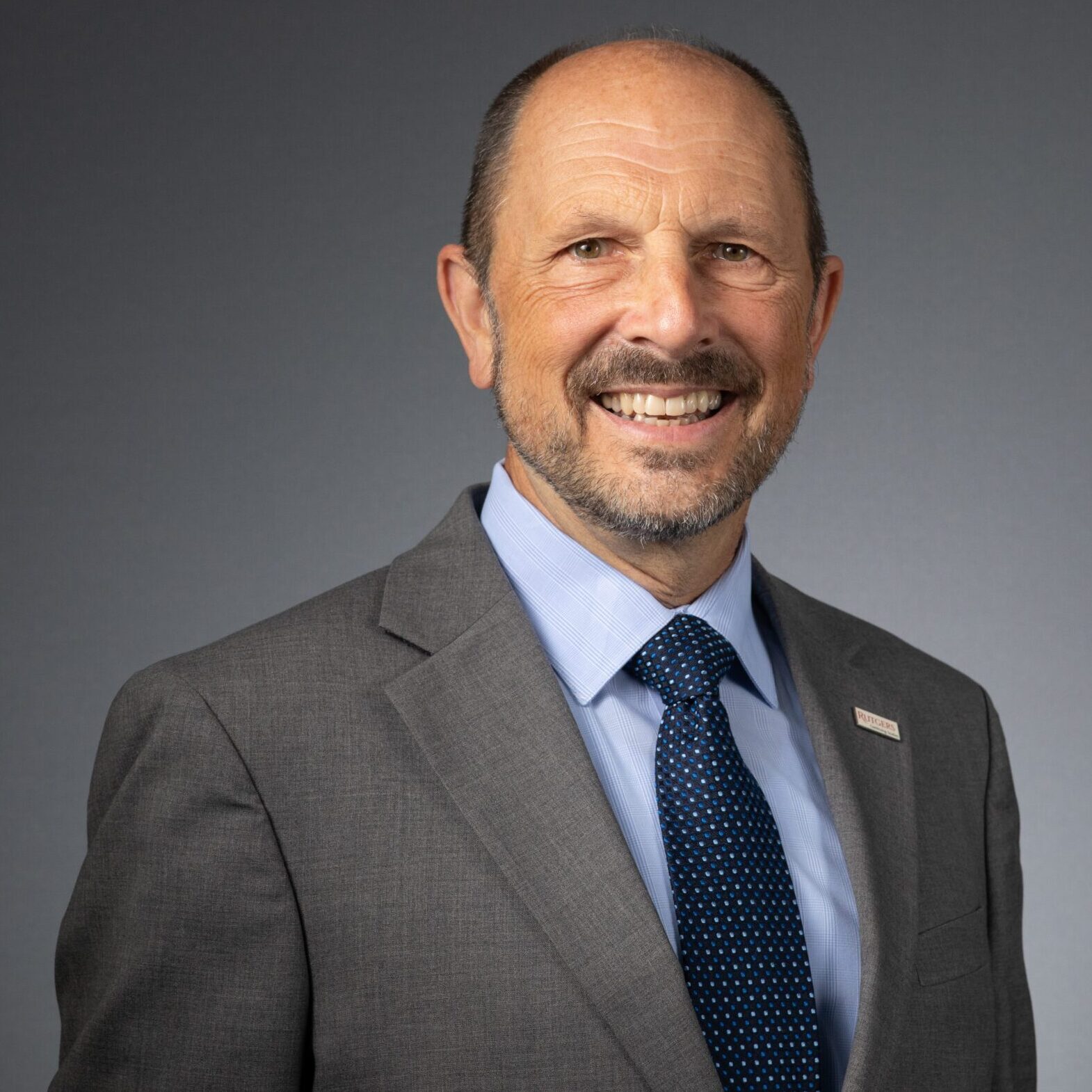 A person (Richard Novak) smiling