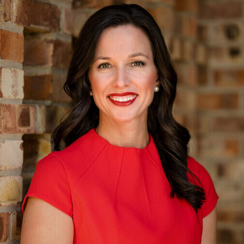 A person (Jocelyn Widmer) smiling