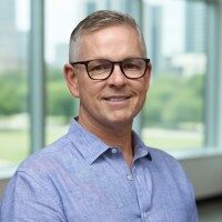 A person (Will Scott) smiling